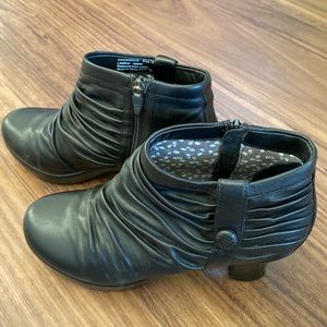 Dansko black side zip ankle boots.